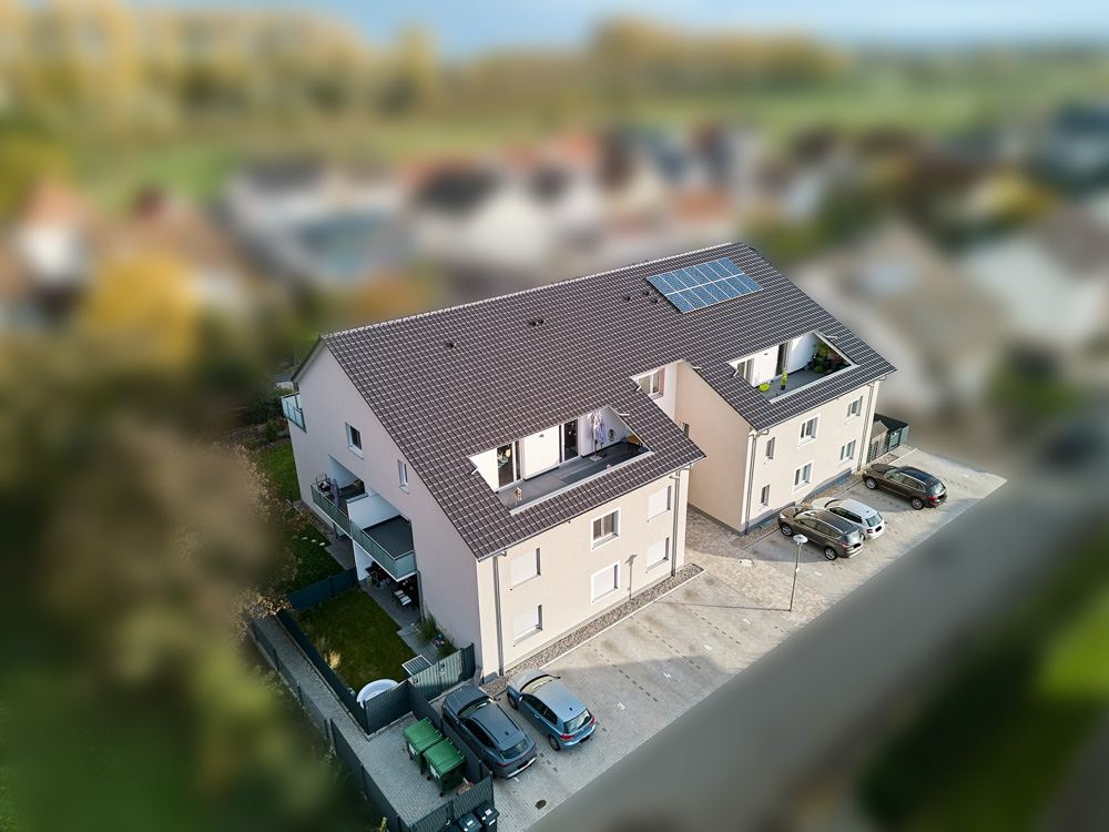 Luftaufnahme eines Mehrfamilienhauses mit 13 Wohneinheiten in Oberhausen-Rheinhausen